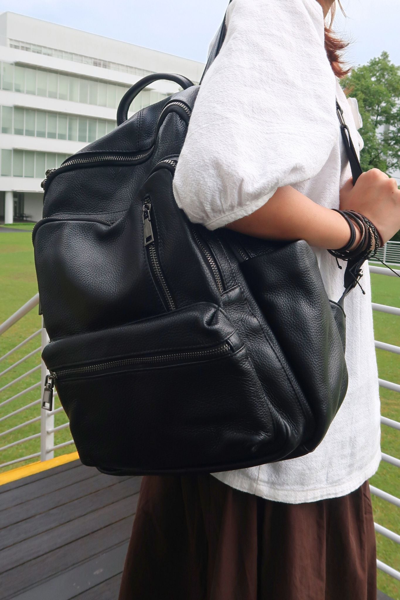 Unisex cowhide leather backpack multi zip design