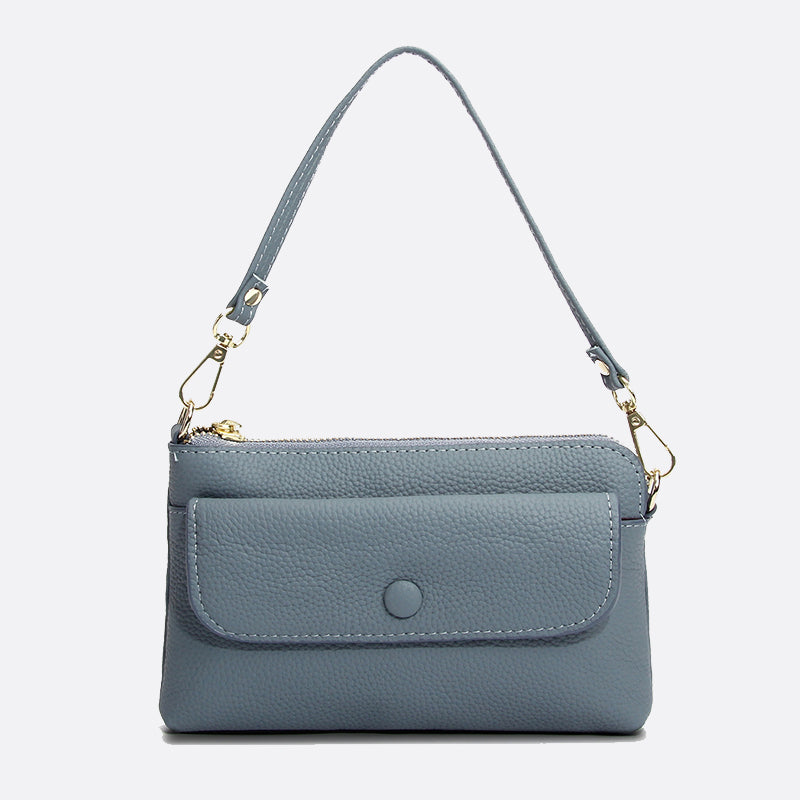 Women's cowhide leather clutch bag Button design