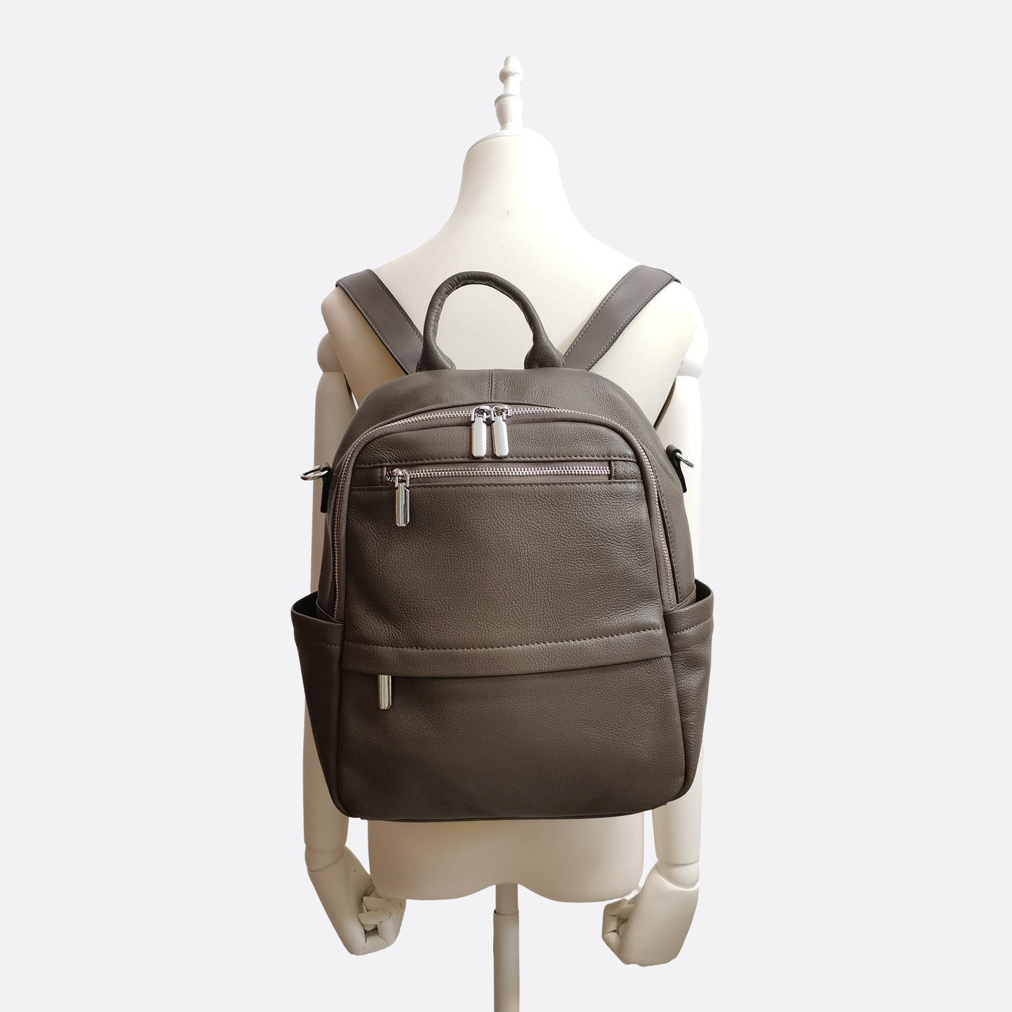 Women's multi zip cowhide leather backpack