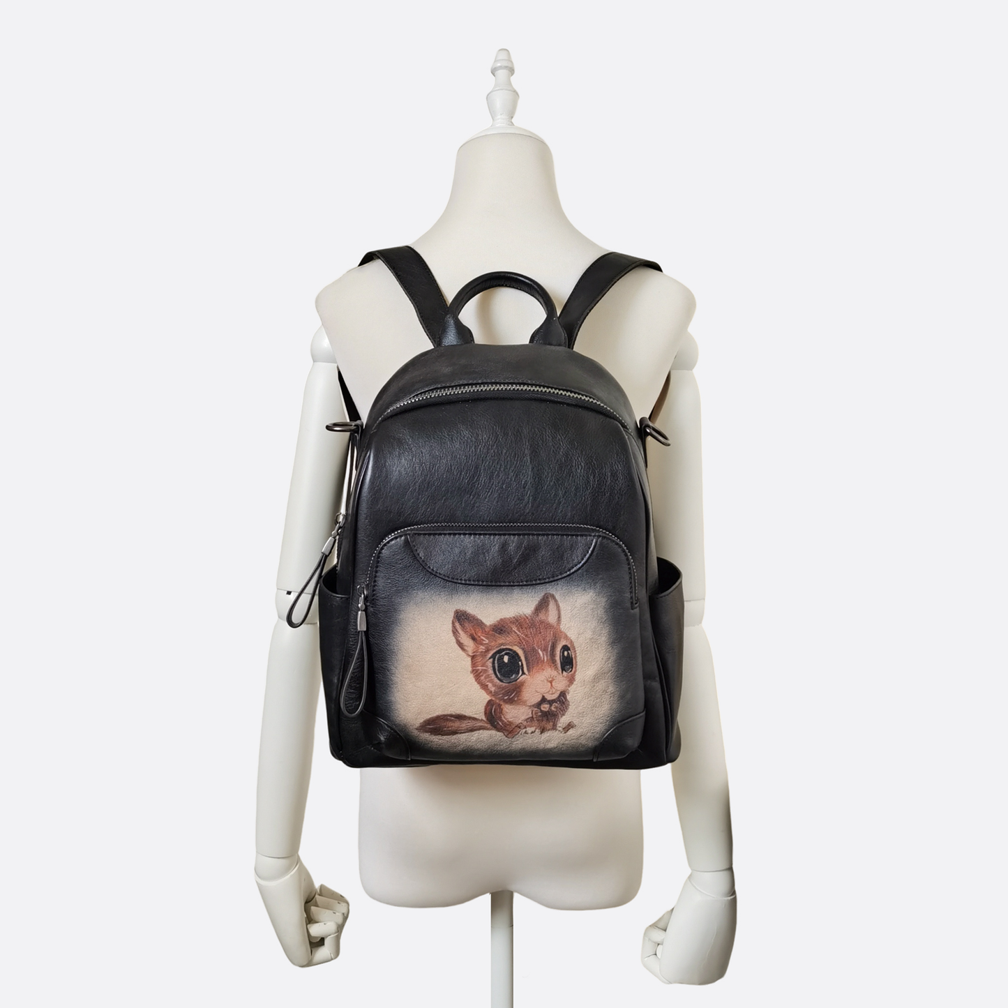 Women's genuine cowhide leather sling bag/backpack Squirrel design