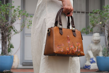 Women's embossed genuine cowhide leather handbag Kunis design