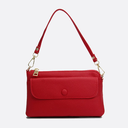 Women's cowhide leather clutch bag Button design