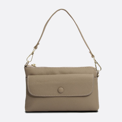 Women's cowhide leather clutch bag Button design
