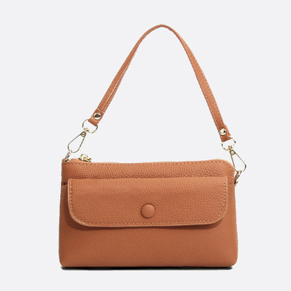 Women's cowhide leather clutch bag Button design
