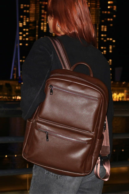 Unisex cowhide leather Multi zip V2 design backpack with luggage/trolley sleeve