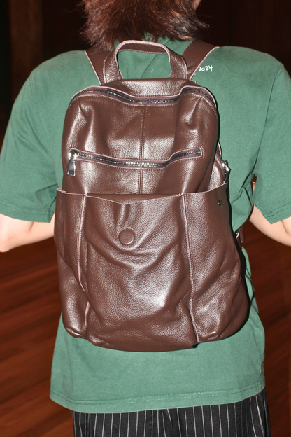 Unisex cowhide leather backpack Snap design with strap pouch