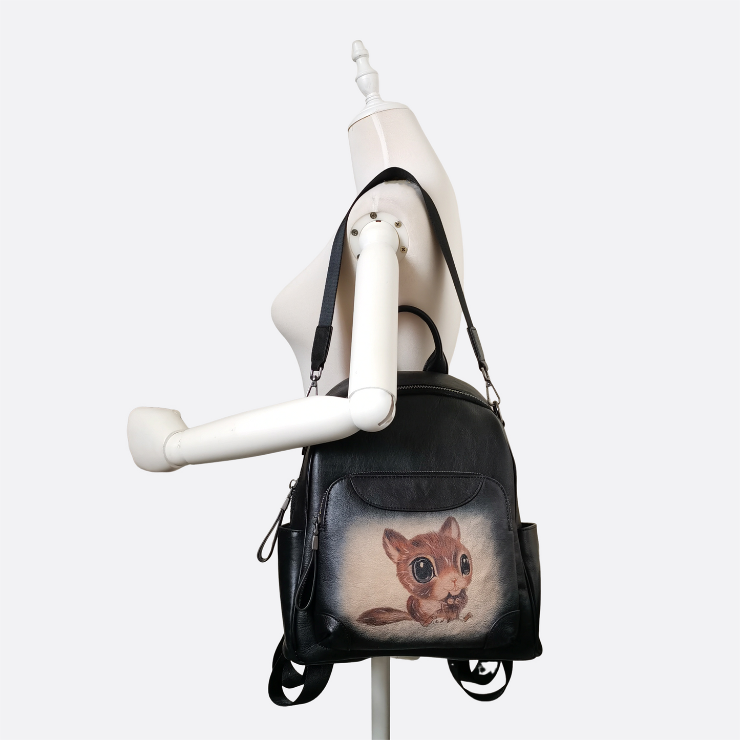Women's genuine cowhide leather sling bag/backpack Squirrel design
