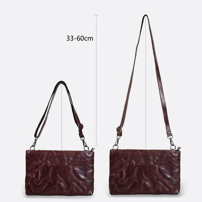 Unisex genuine cowhide leather two way clutch with sling and wrist strap