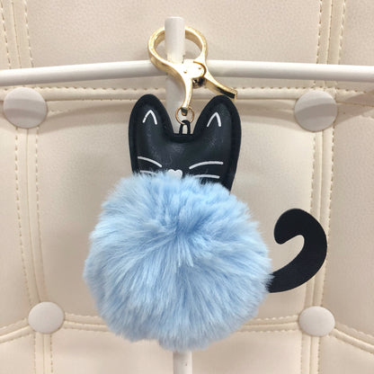 Cat with fur ball bag charm by Tomorrow Closet